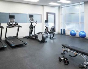 Fitness center with treadmills at the Hampton Inn & Suites Memphis-Beale Street.