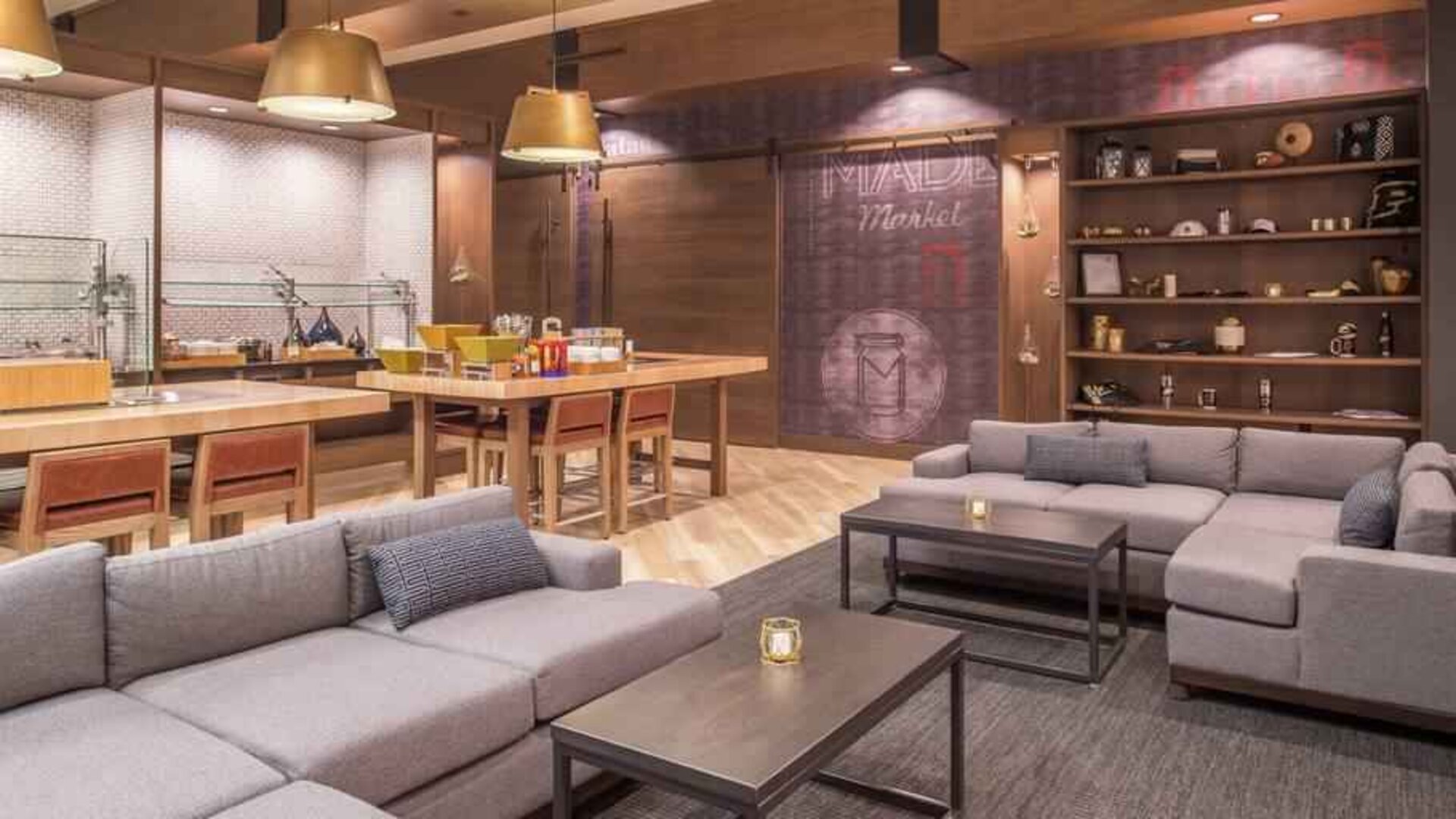 Dining area with tables and chairs at the DoubleTree by Hilton Lafayette East.