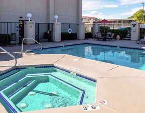 Beautiful outdoor area with two pools at the Hampton Inn Albuquerque, University-Midtown (UNM).