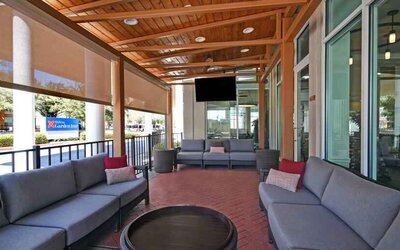 Outdoor terrace perfect as workspace at the Hilton Garden Inn Houston Galleria Area.