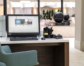 Dedicated workspace and business center at Embassy Suites by Hilton Seattle Tacoma International Airport.