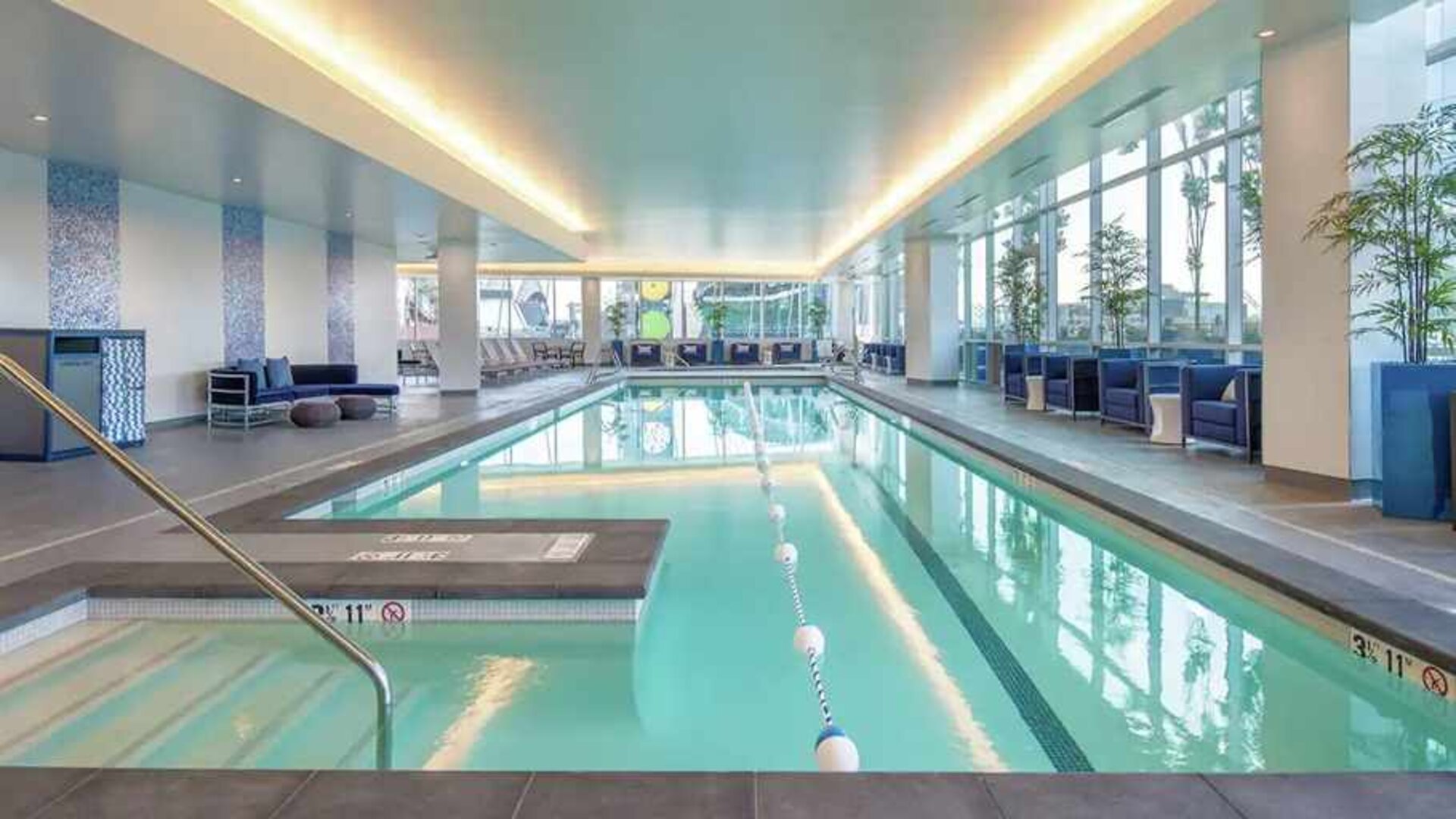 large indoor pool ideal for doing laps at Embassy Suites by Hilton Seattle Downtown Pioneer Square.