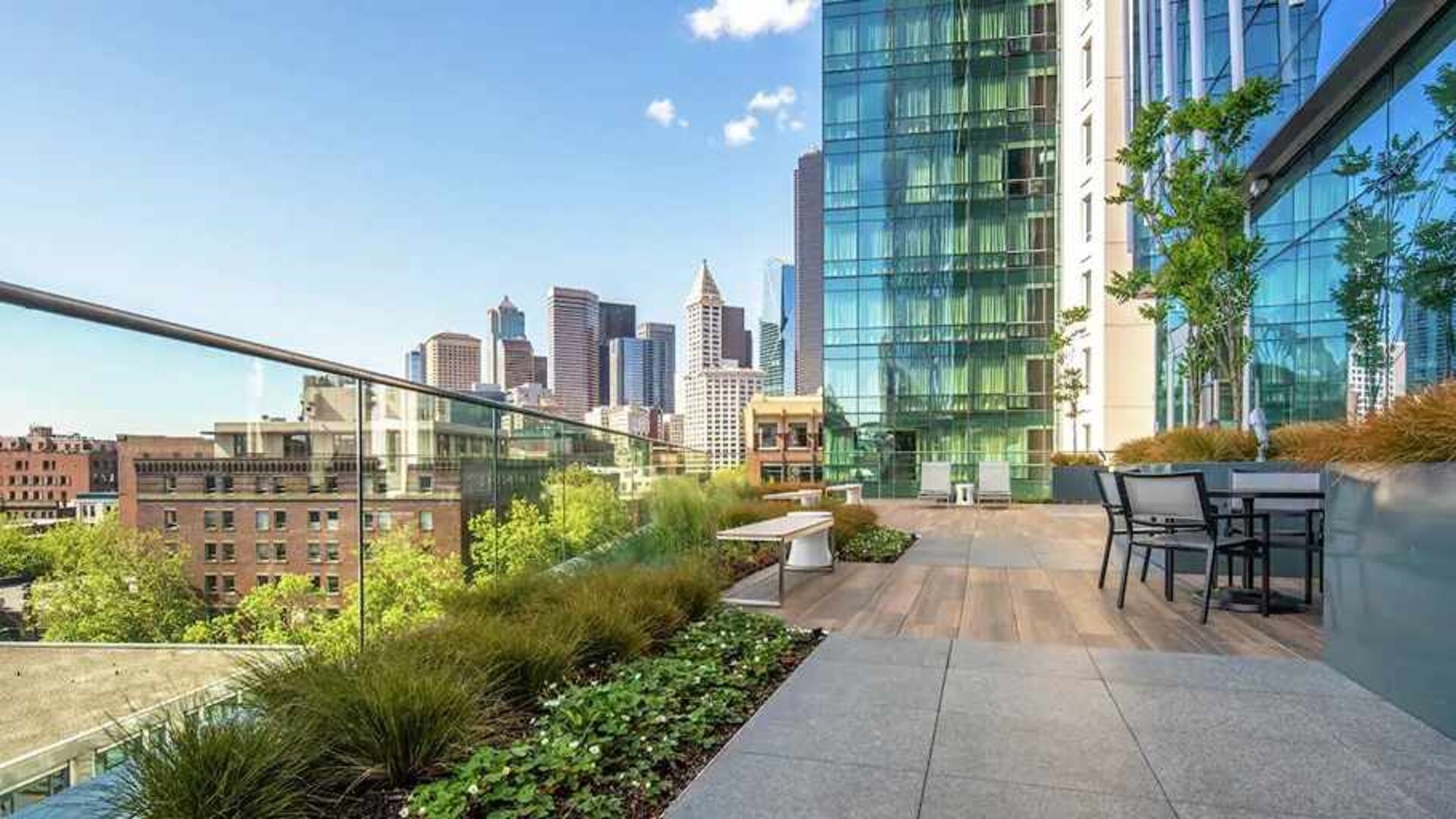 lovely outdoor patio with city scape views at Embassy Suites by Hilton Seattle Downtown Pioneer Square.
