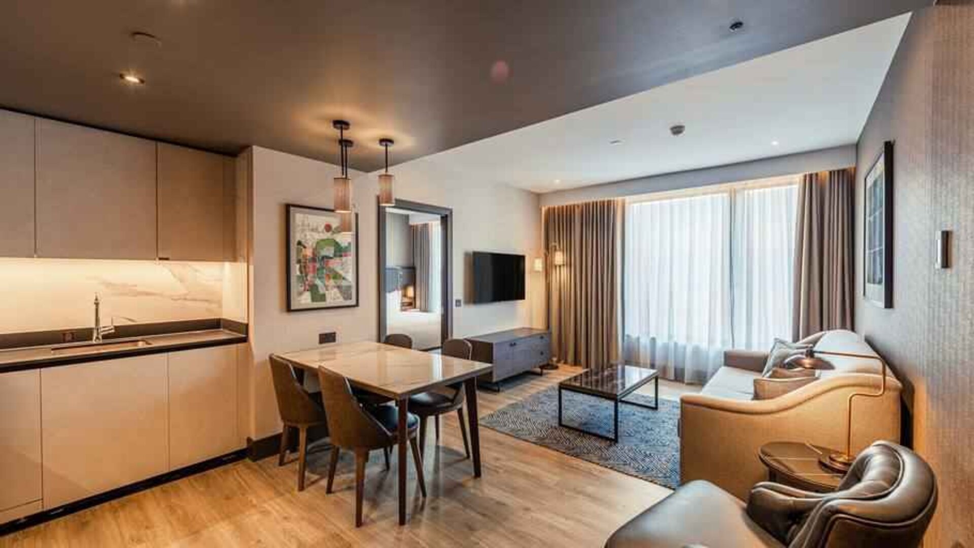 Hotel apartment with kitchen and living room at the Fellows House Cambridge, Curio Collection by Hilton.