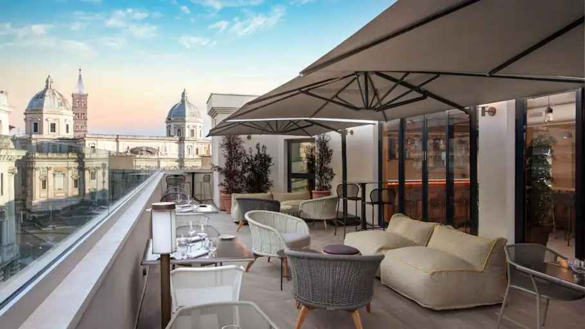 Beautiful outdoor terrace overlooking the city at the DoubleTree by Hilton Rome Monti.