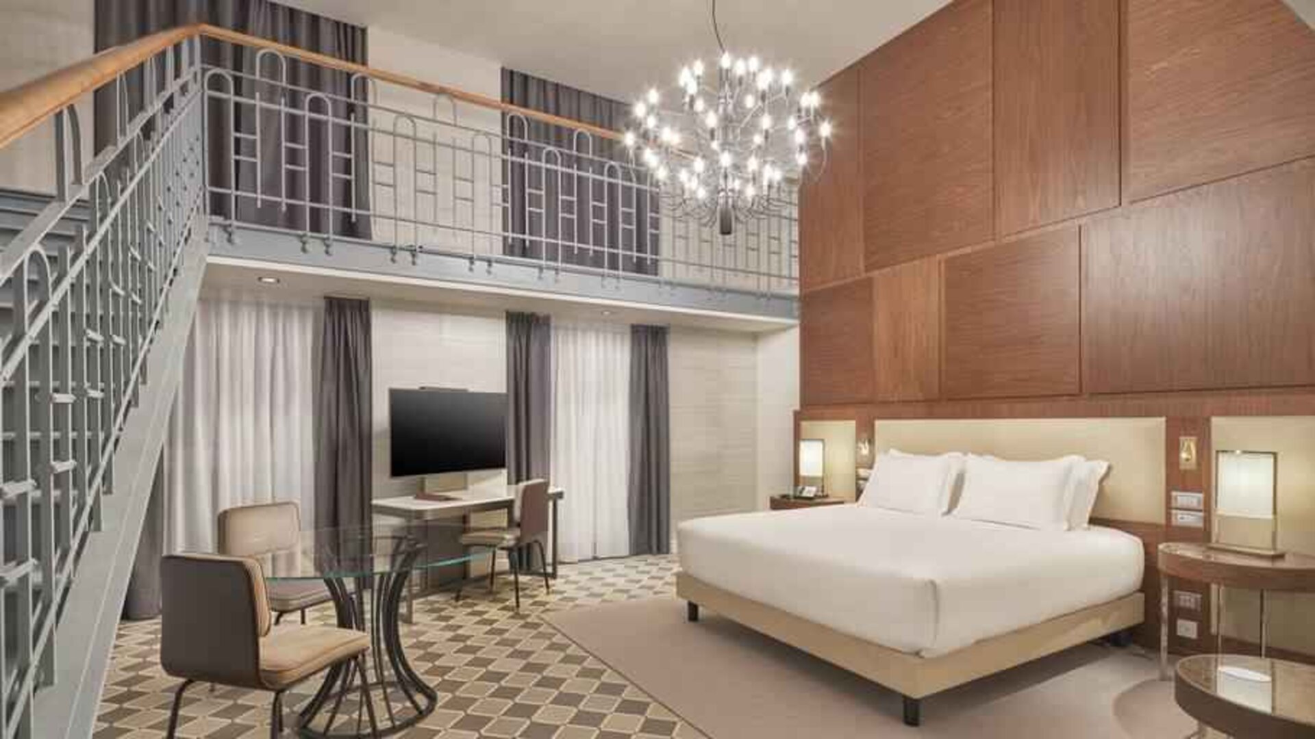 Spacious king suite with working station at the DoubleTree by Hilton Trieste.