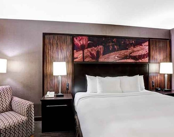 Beautiful king suite with lounge area at DoubleTree by Hilton Hotel Downtown Wilmington - Legal District.