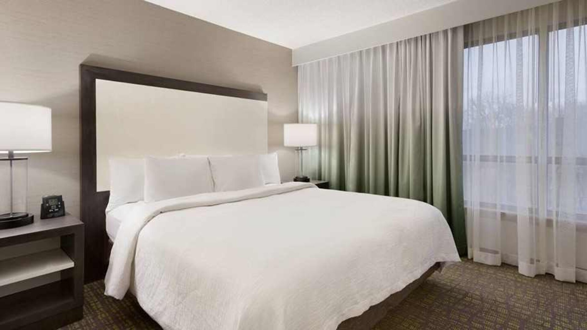 luxurious king bedrooom at Embassy Suites by Hilton Newark Wilmington South.