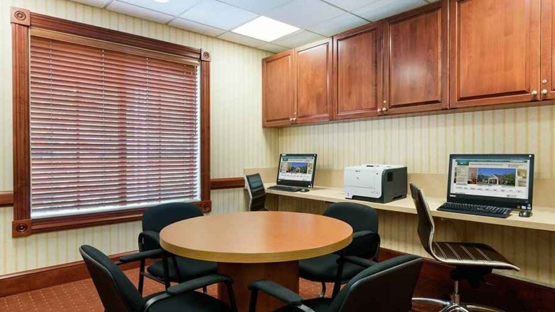business center with work desk, PC, internet, and printer at Homewood Suites by Hilton Newark-Wilmington South Area.