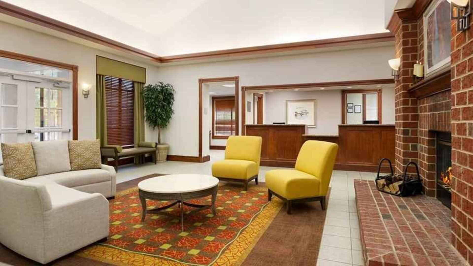 comfortable lobby lounge area ideal for coworking at Homewood Suites by Hilton Newark-Wilmington South Area.