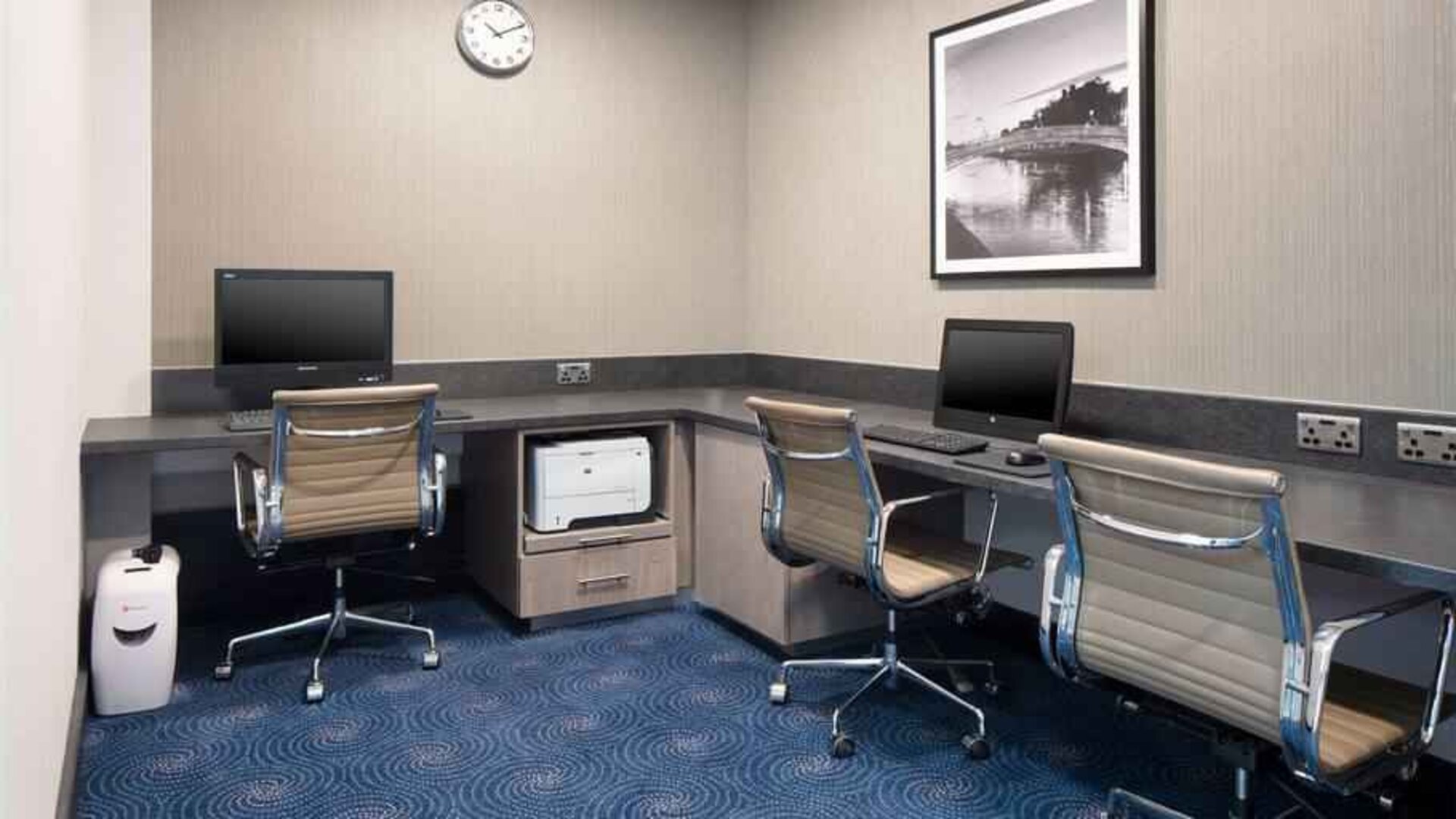 Working station with computers and printer at the Hilton Garden Inn Dublin Custom House.