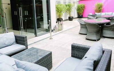 Outdoor patio perfect as workspace at the Morrison, a DoubleTree by Hilton Hotel.