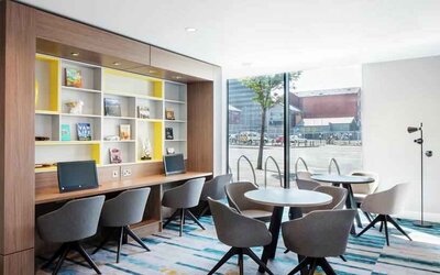 Working station with computers at the Hampton by Hilton Belfast City Centre.