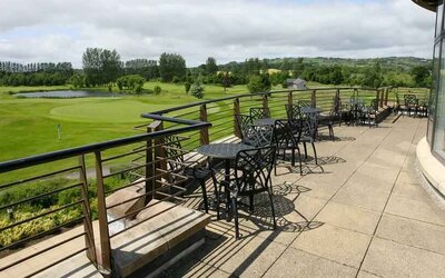 Outdoor terrace overlooking the golf field at the Hilton Belfast Templepatrick Golf & Country Club.
