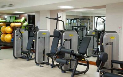 Fitness center with machines at the Hilton Dublin Airport.