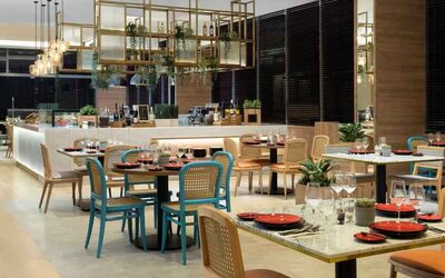 Dining area perfect for co-working at the Hilton Garden Inn Jakarta Taman Palem.
