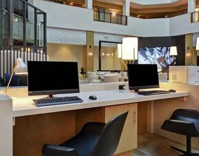 dedicated work station and business center with PC, work desk, internet, and printers at Embassy Suites by Hilton Raleigh Durham Research Triangle.