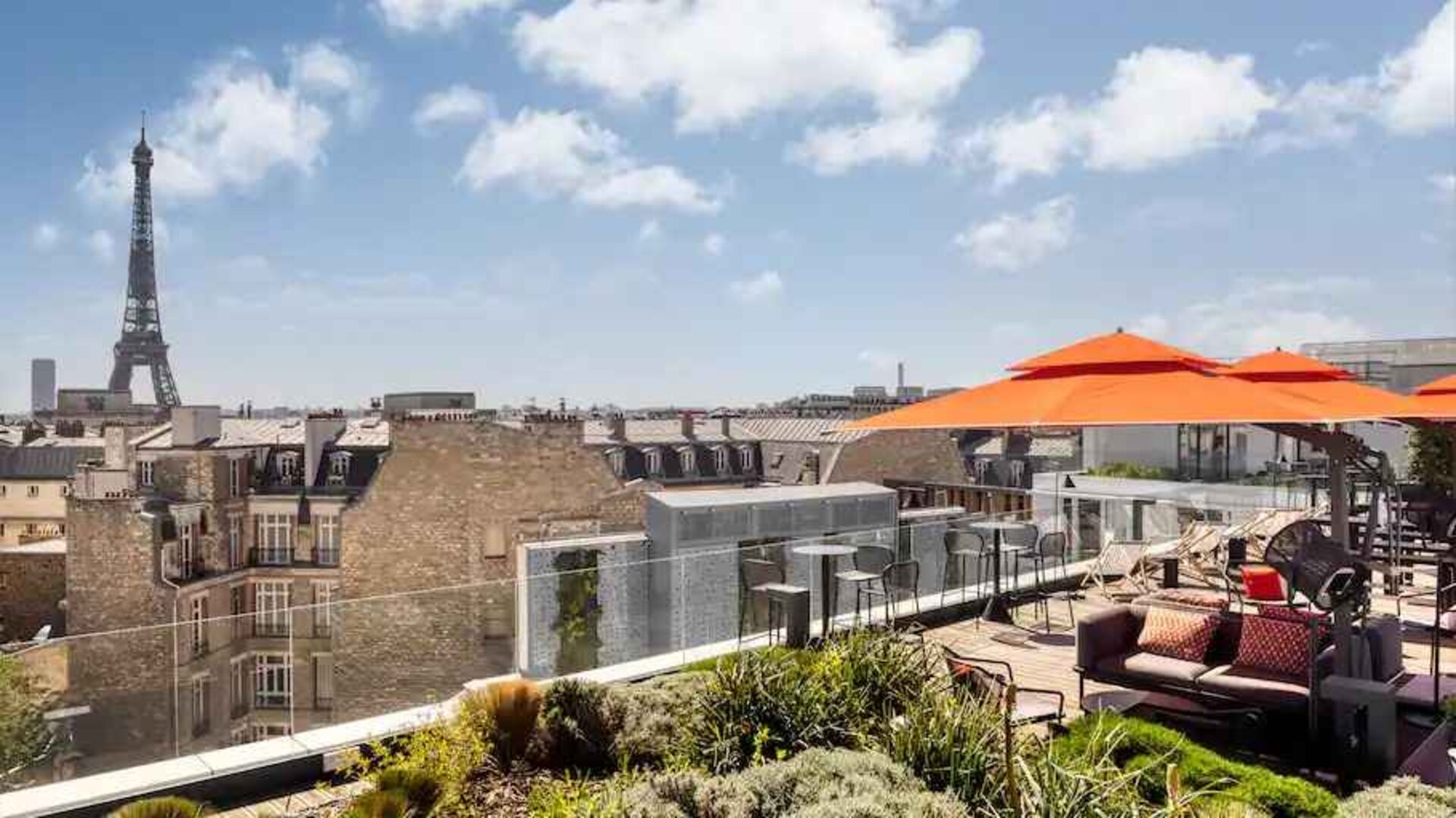Beautiful outdoor terrace overlooking the city and the tour eiffel at the Canopy by Hilton Paris Trocadero.
