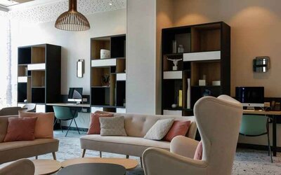 Comfortable lobby workspace at the Hilton Garden Inn Bordeaux Centre.