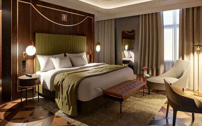 King suite with working station at the Hotel Saski Krakow Curio Collection by Hilton.