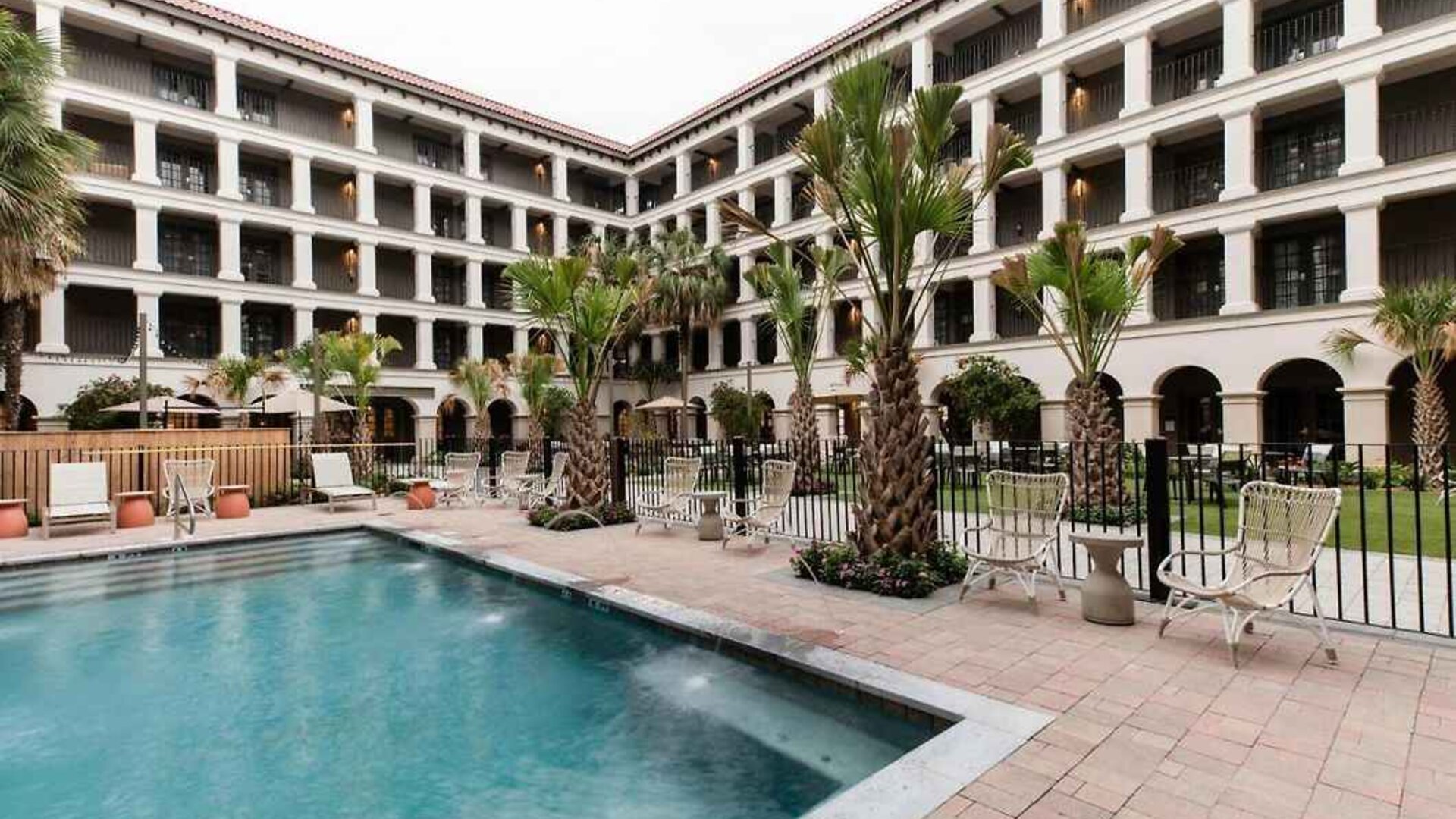 Stunning outdoor pool with pool chairs at The Modern Honolulu.