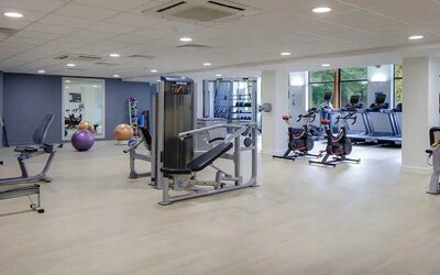 Well equipped fitness center at Hilton London Watford.