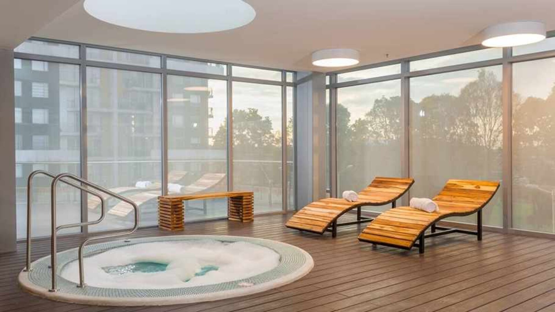 relaxing indoor jacuzzi with pool beds at Hilton Garden Inn Bogota Airport.