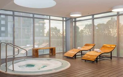 relaxing indoor jacuzzi with pool beds at Hilton Garden Inn Bogota Airport.