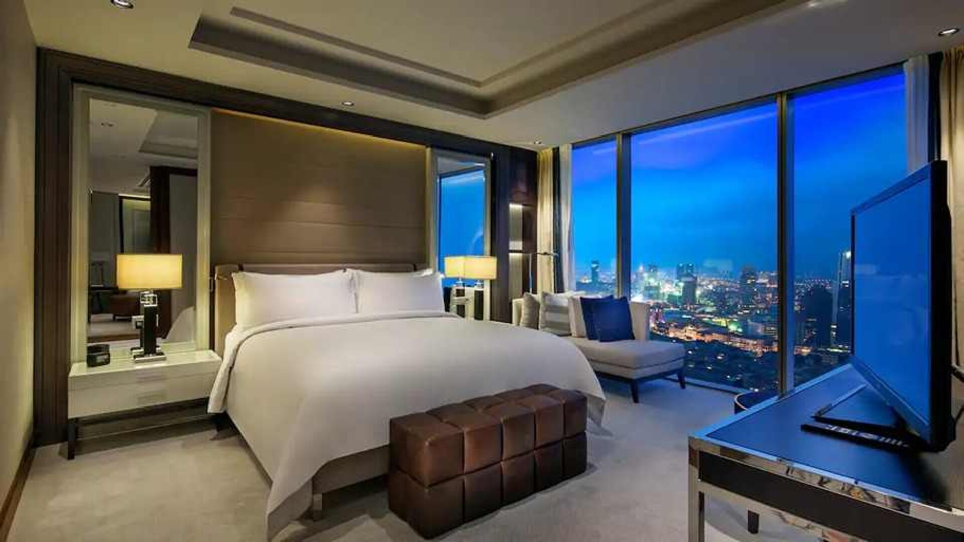 luxurious king room with TV and city views at Hilton Istanbul Bomonti Hotel & Conference Center.