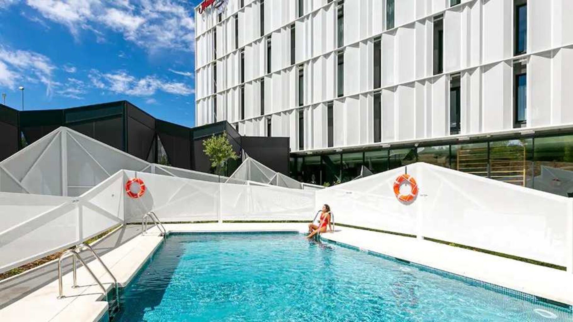 lovely and large outdoor pool at Hampton by Hilton Alcobendas Madrid.