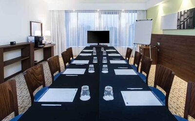 Meeting room with TV screen at the Hampton by Hilton Gdansk Oliwa.
