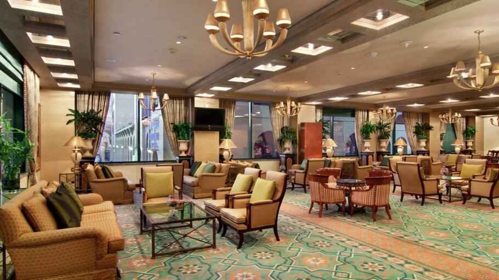 Comfortable workspace with sofas at the Madinah Hilton Hotel.