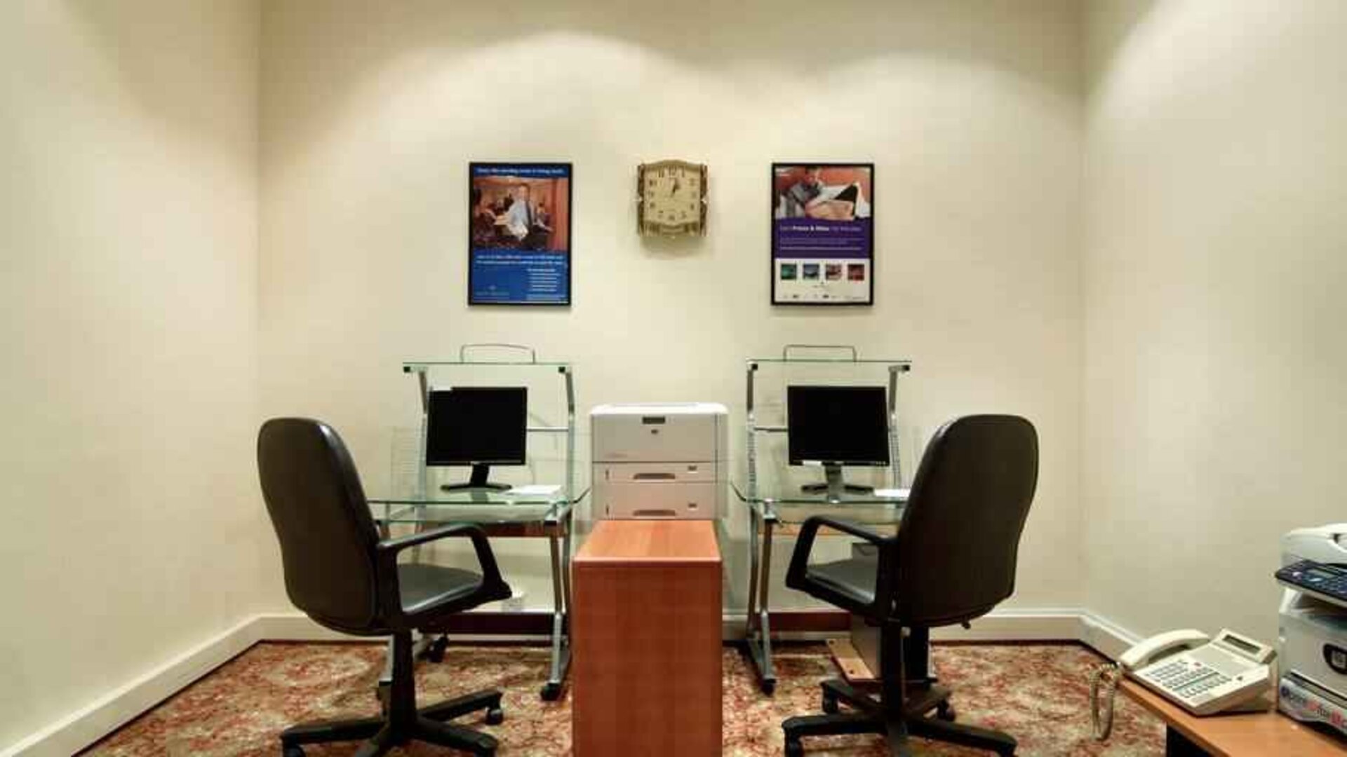 Business center with computers and printer at the Madinah Hilton Hotel.