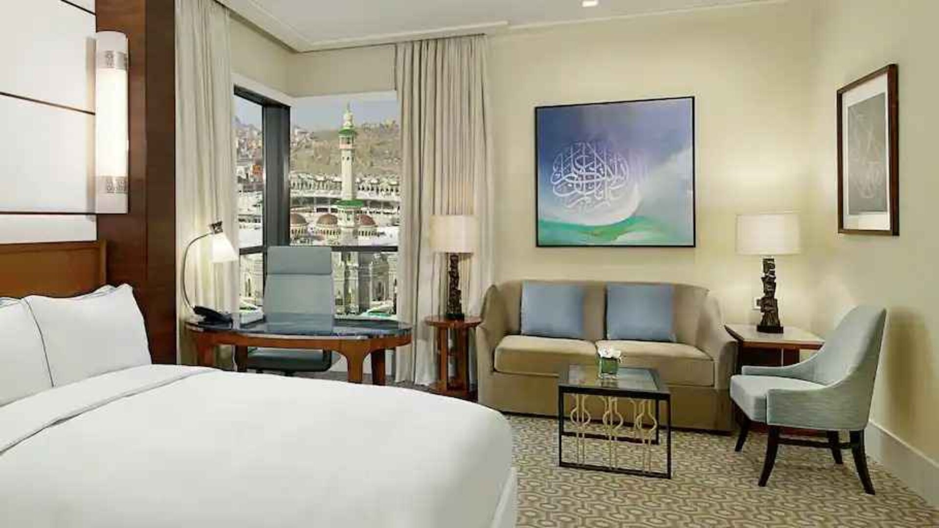 King bedroom with desk and sofa at the Conrad Makkah.