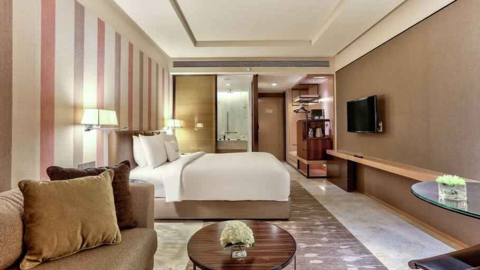 Comfortable king guestroom at the DoubleTree by Hilton Sukhumvit Bangkok.