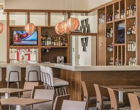 comfortable lobby and coworking space at Hampton Inn & Suites by Hilton Salamanca Bajio.