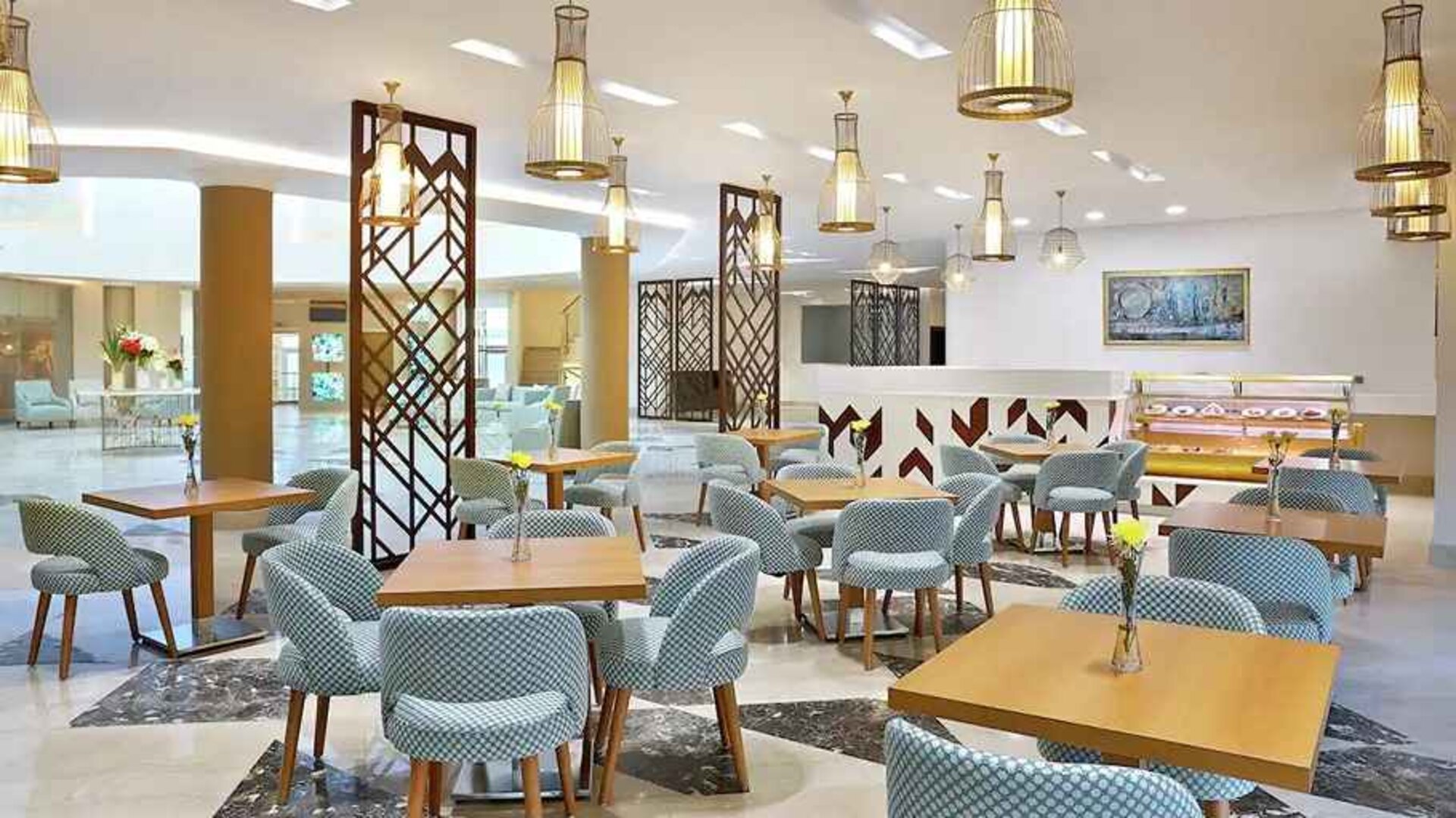 spacious lobby and coworking space at Hilton Hurghada Plaza.