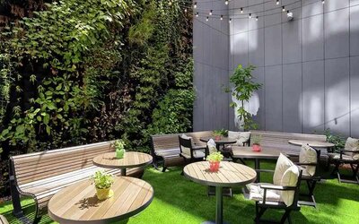 pretty outdoor terrace with seating area ideal for coworking at Hilton Garden Inn Budapest City Centre.
