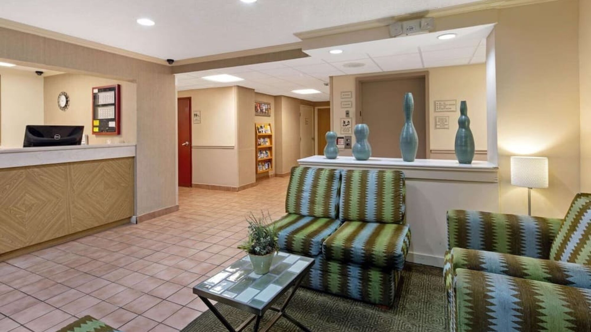 Reception and lobby area featuring guest services, comfortable seating, and easy access to hotel amenities and dining facilities.