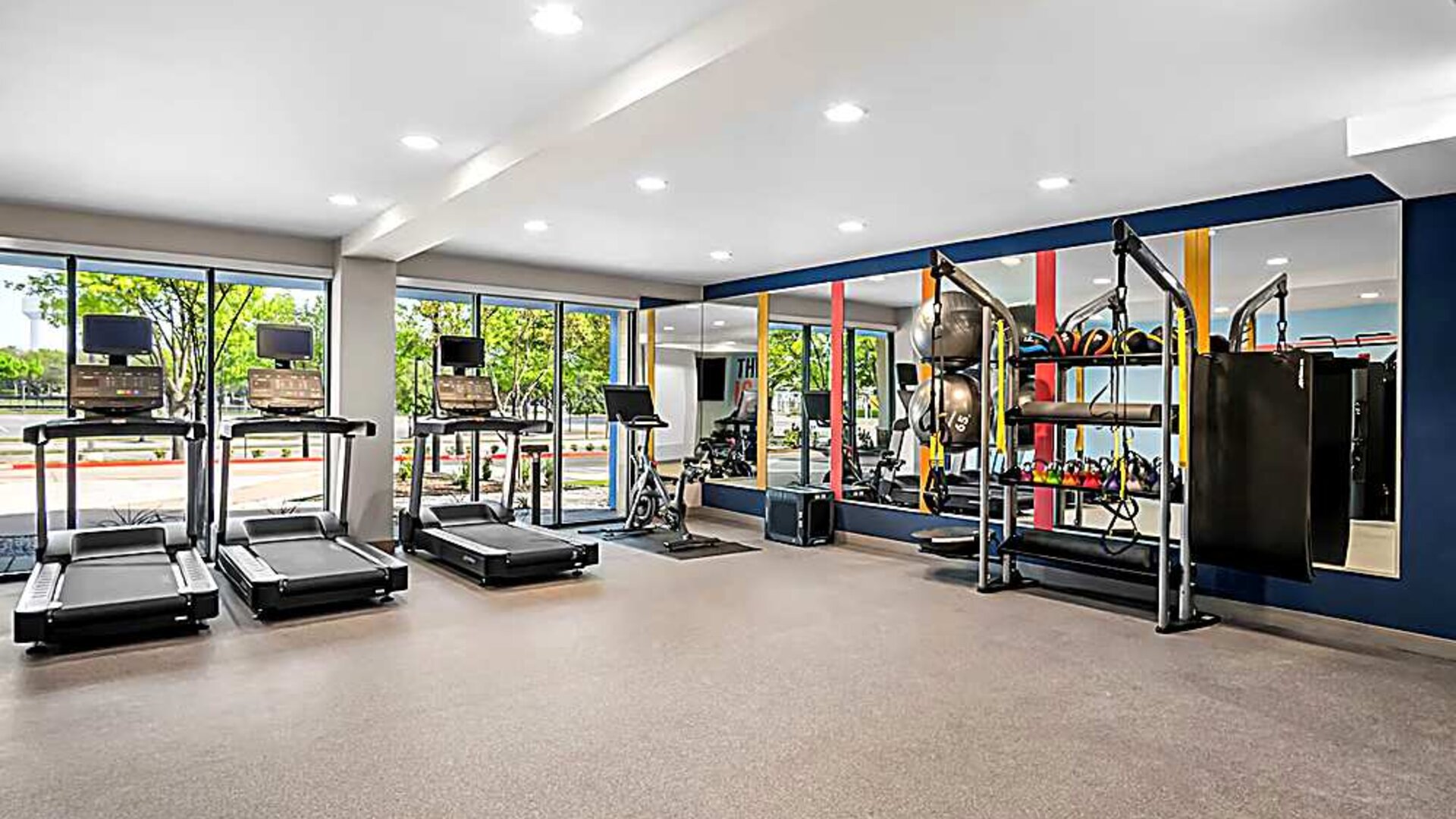 Fitness center with treadmills and other equipment. 