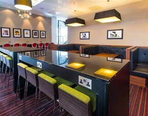 Coworking space with places to charge laptops and other devices. 