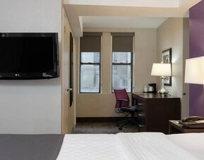 Day use room with work desk at La Quinta Inn & Suites By Wyndham New York City Central Park.