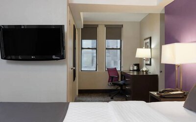 Day use room with work desk at La Quinta Inn & Suites By Wyndham New York City Central Park.