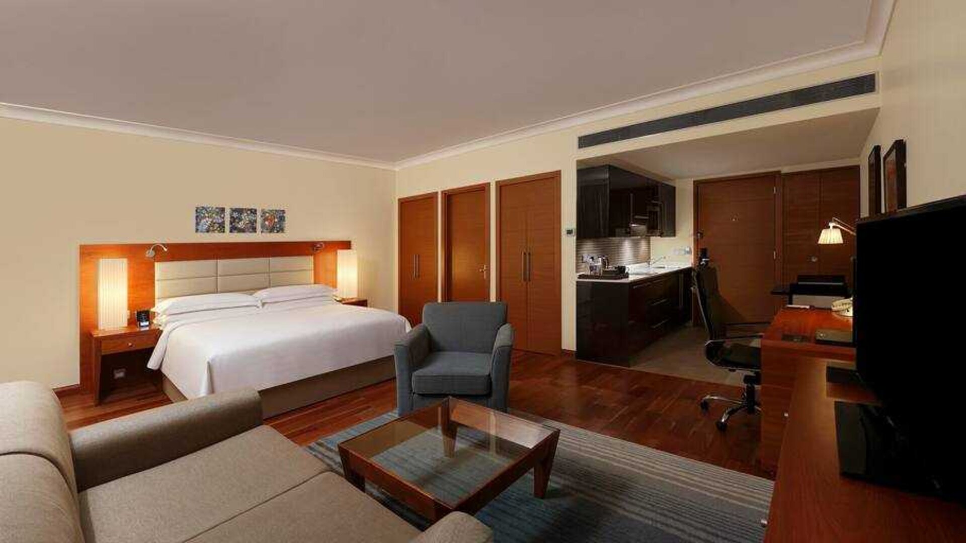 Comfortable king bedroom at the Hilton Bangalore Embassy GolfLinks.