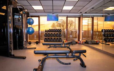 Fully equipped fitness center at the Hilton Madrid Airport.