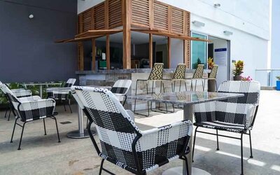 Outdoor patio perfect as workspace at the Hampton by Hilton Cartagena.