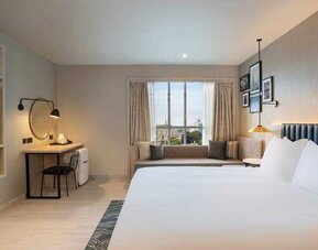 Hotel room with TV screen and desk at the Hilton Garden Inn Peterborough City Centre.