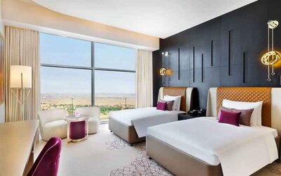 Twin room at the AlRayyan Hotel Doha, Curio Collection by Hilton.