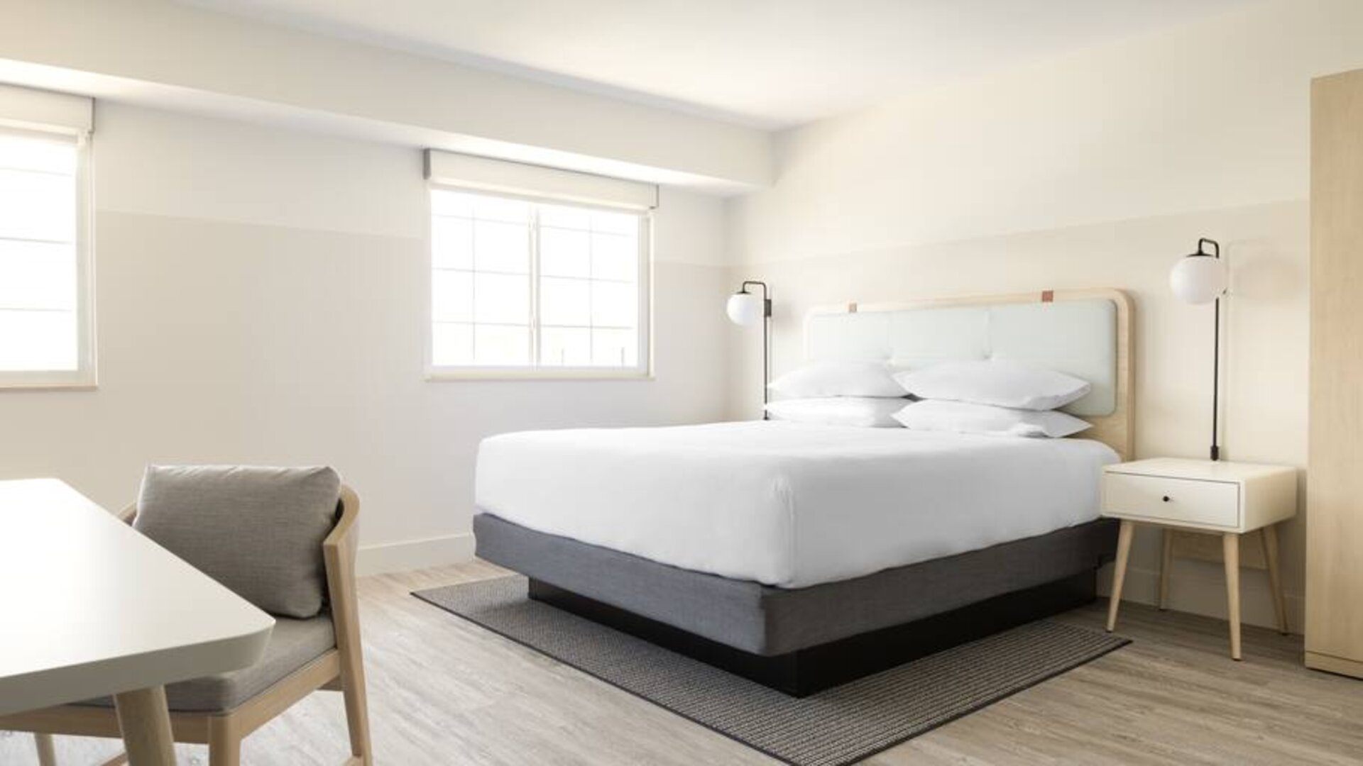 Hotel room with desk at the Hampton By Hilton Grand Cayman.