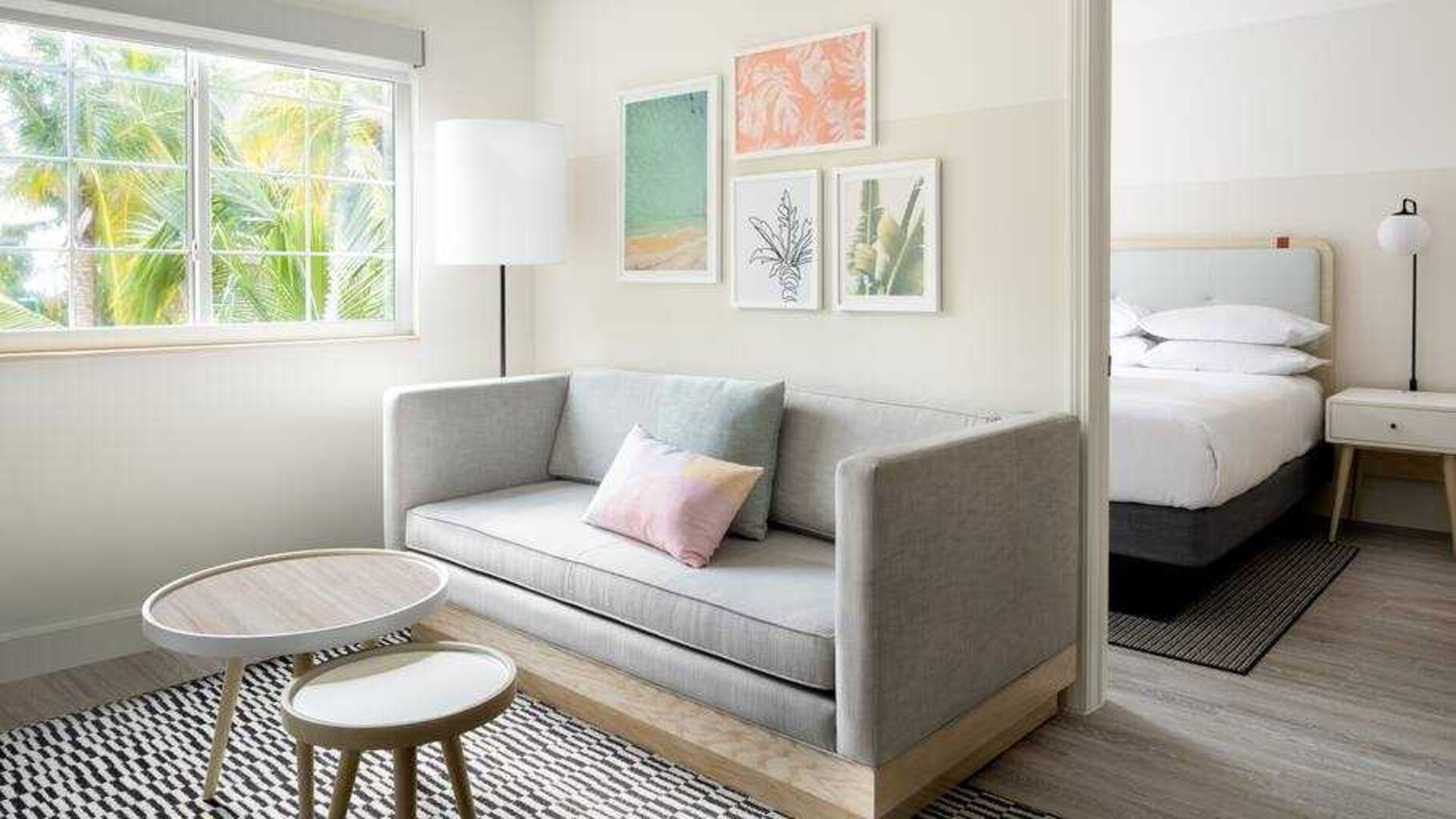 Living room perfect as workspace at the Hampton By Hilton Grand Cayman.